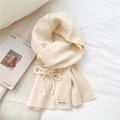 Close-up of beige knitted scarf featuring vertical stripes and a bow tie detail - Creamy White Bowknot