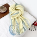 Detail of soft wool blend striped scarf showing knit texture and long fluffy tassels - 27x190cm (Including Tassel 218cm) / Yellow and Blue Striped Style