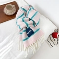 Detailed view of striped wool-blend scarf with long tassels and branded woven label - Large Label Style / Pink Green (Striped)