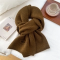 Close-up of thick dark brown knitted scarf featuring soft texture and Egg Doll embroidered logo - 28*186cm / Dark Ochre