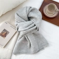 Detail of soft gray knitted scarf featuring pink embroidery and ribbed texture finish - 28*186cm / Light Gray