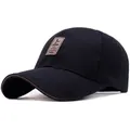 Black cotton baseball cap with curved brim and brown leather patch, 45-degree view - Black with Khaki Trim