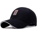 Black cotton baseball cap with contrasting white brim edge and brown leather patch - Black with White Edge