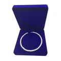 Detailed view of round white pearl necklace in a premium navy blue velvet jewelry gift box - Round Necklace Box 19*19*4CM / Sapphire Blue