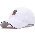 White cotton baseball cap with brown leather patch and contrast brim piping detail - White