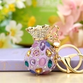 Sparkling crystal fortune bag keychain in purple and gold with a metallic lobster clasp - Purple Rhinestone Lucky Bag