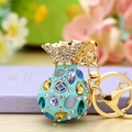 Sky blue money bag keychain with gold plating and colorful crystals and diamonds - Blue Rhinestone Lucky Bag