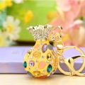 Yellow fortune bag keychain with colorful crystals and gold plating in a variant style - Yellow Rhinestone Lucky Bag