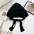 Detailed texture of black knitted hood scarf with stylish long ties and soft wool fabric - Black