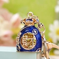 Blue enamel fortune bag keychain with golden 'Cai' character and sparkling rhinestones - Sapphire Blue Lucky Bag