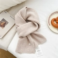 Beige ribbed knit wool scarf featuring a silver metal logo tag and brand labels - Off White