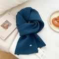 Solid navy blue ribbed knit wool scarf with a decorative brand button for winter - Deep Sea Blue