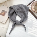 Close-up of gray knitted triangle scarf showing soft wool texture and tie-up design details - 55cm*55cm*100cm / Gray