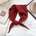 Close-up of deep red knitted triangle scarf showing fine texture and knotted design - 55cm*55cm*100cm / Red