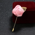 Pink satin rose flower brooch pin with golden leaf detail on a metal needle - Pink