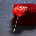 Elegant red silk rose lapel pin with gold metal leaf on a velvet jewelry gift box - Red