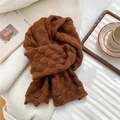 Macro detail of caramel brown knit scarf with thick fish scale textured warm wool yarn - 20x140cm / Caramel color