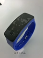 Close-up of a blue silicone strap with a rectangular LED touch screen digital watch - Dark Blue