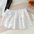 Vue détaillée de la jupe en dentelle florale blanche avec broderie et nœud en ruban - Taille unique / Ruban Blanc Fleur Unique