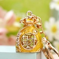 Golden money bag keychain with crystal accents and lucky Chinese fortune character - Yellow Lucky Bag