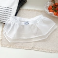 Detailaufnahme von weißem Spitzenrock-Extender mit elastischem Bund und rosa Schleife - Integriert Organza Weiß / Weiß