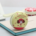 Yellow tin coin purse with cartoon girl design and small zipper for earphone storage - Prado Animal Island Yellow Style 03