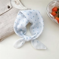 Blue polka dot cotton linen square scarf presented in a stylish knotted arrangement - Half Circle Blue