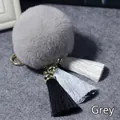 Stijlvolle grijze rex konijnenbont pompon sleutelhanger met drie gekleurde kwastjes - 8cm / Grijs
