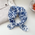 Blue leopard print cotton-linen neck scarf tied as an elegant hair accessory decoration - Spotted Mark White