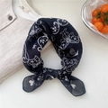 Dark blue linen square scarf with white floral patterns styled on a beige linen shirt - 11 Heart Star Leaf Black