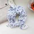 White cotton linen scarf with blue floral print, styled as a headband for women - Tiny Floret White
