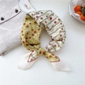 Avocado green silk scarf with cherry print tied in an elegant bow knot style - 06 Yellow Fruit & Stripes
