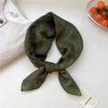 Vintage dark green paisley square scarf in cotton-linen fabric tied in a classic bow - Heart Paisley Green