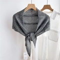 Close-up of gray hollowed knit shawl showing intricate crochet texture and paper tag - 82x82x142cm / Gray