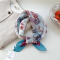 Light blue floral cotton linen square scarf with botanical print tied at the neckline - Ant Floral