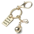 Golden boxing glove keychain with engraved Strong Beautiful Health metal tag - Kettlebell and Tag Gold