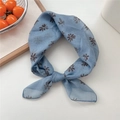 Light blue floral cotton linen scarf with daisy pattern tied in a soft bow style - 07 Blue Brush Floral