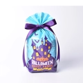 Close-up of Halloween treat bag with haunted house print and purple ribbon bow - Rook Pattern / Blue