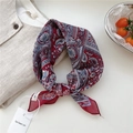 Red paisley cotton linen scarf with floral pattern shown on a linen vest background - Geometric Pattern Red
