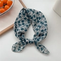 Off-white cotton linen neck scarf with dark blue leaf print in a stylish tied knot - 14 Green Leaf Floral