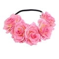 Detail of pink fabric roses on a black elastic headband for party styling - Deep Pink