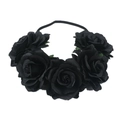 Detail of five artificial black roses on a bohemian style headband with a slim black band - Black