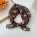Deep brown cotton linen square scarf with light blue floral print in a tied style - 15 Imprint Brown Floral