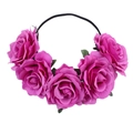 Detailed view of magenta artificial roses on a bohemian floral headband for festivals - Light Purple