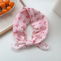 Light pink cotton linen scarf with red cherry patterns tied in a stylish bow knot - 19 Pink Cherry Bow