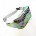 Flat lay of iridescent PVC waist bag with reflective metallic finish and nylon strap - Holographic Silver