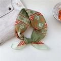 Olive green geometric diamond cotton linen scarf in a stylish knotted display - Diagonal Greek Key Green