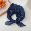 Blue printed neck scarf with orange dots and geometric patterns in a knotted style - 19 Navy Three-Color Bean
