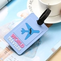 Blue silicone luggage tag with World Traveler text and airplane icon on travel magazine - Light Blue Airplane