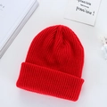 Winter warm knitted beanie in vibrant red color with soft thick ribbed texture - Red